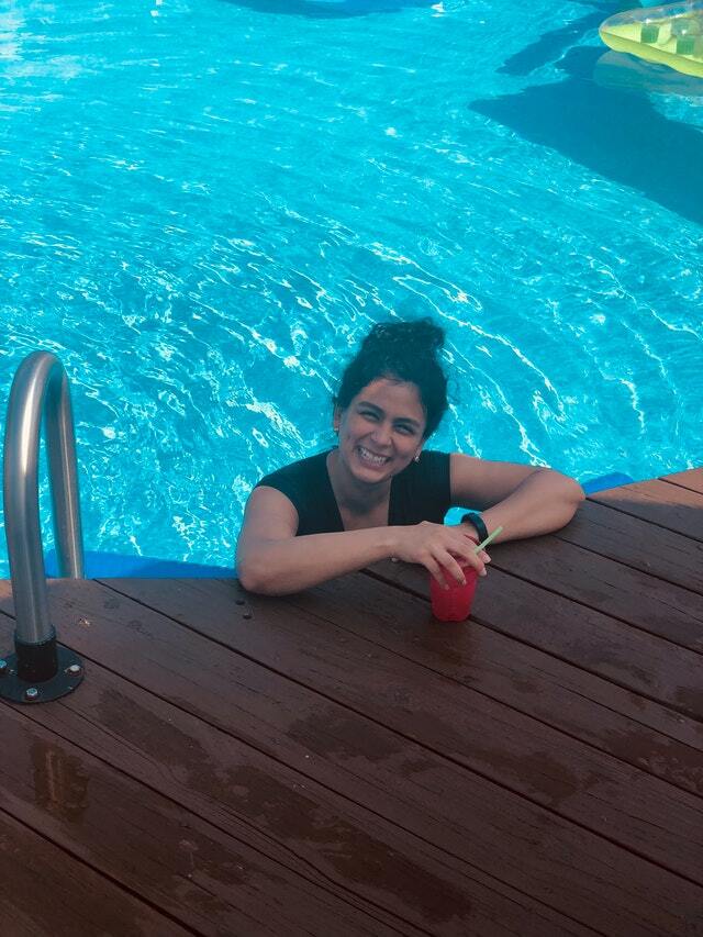 my girlfriend refreshing her self on the pool