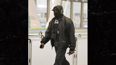 Kanye West Walking Through Airport Like Average Joe