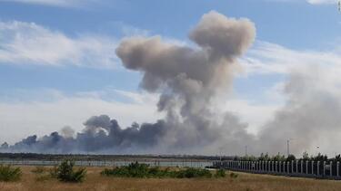 Explosions rock area of Russian airbase in Crimea killing at least one