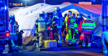 Vehicle plows into crowded Christmas market in Germany, killing 2 and injuring dozens